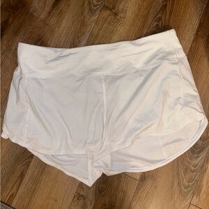 Lululemon white speed up shorts. Size 14 high rise 4”